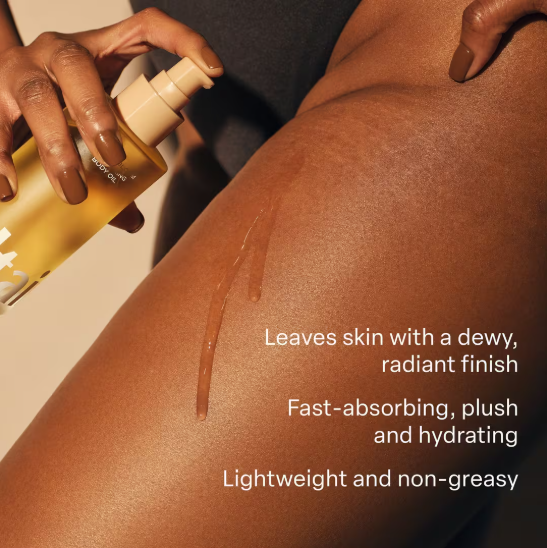 Body oil being applied to skin for a dewy radiant finish